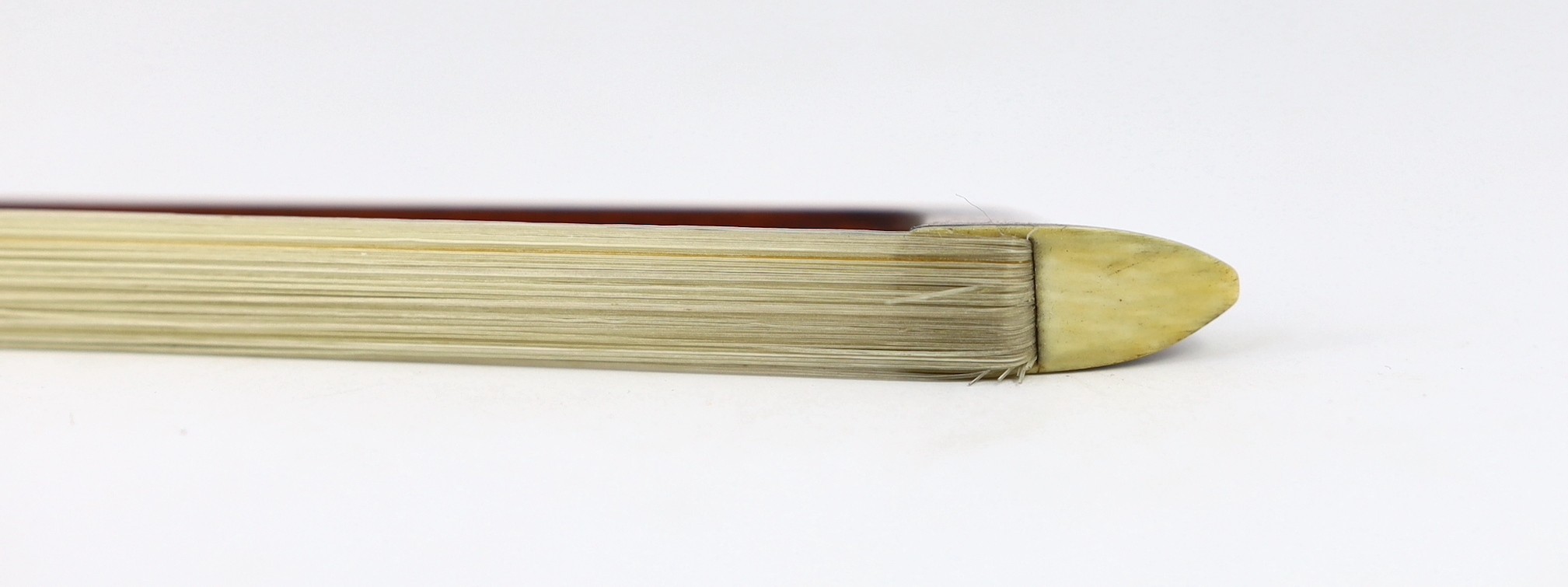 A silver mounted violin bow, stamped DODD, another stamped TOURTE and another bow